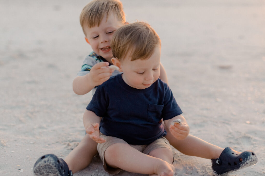 Family playing with shells.