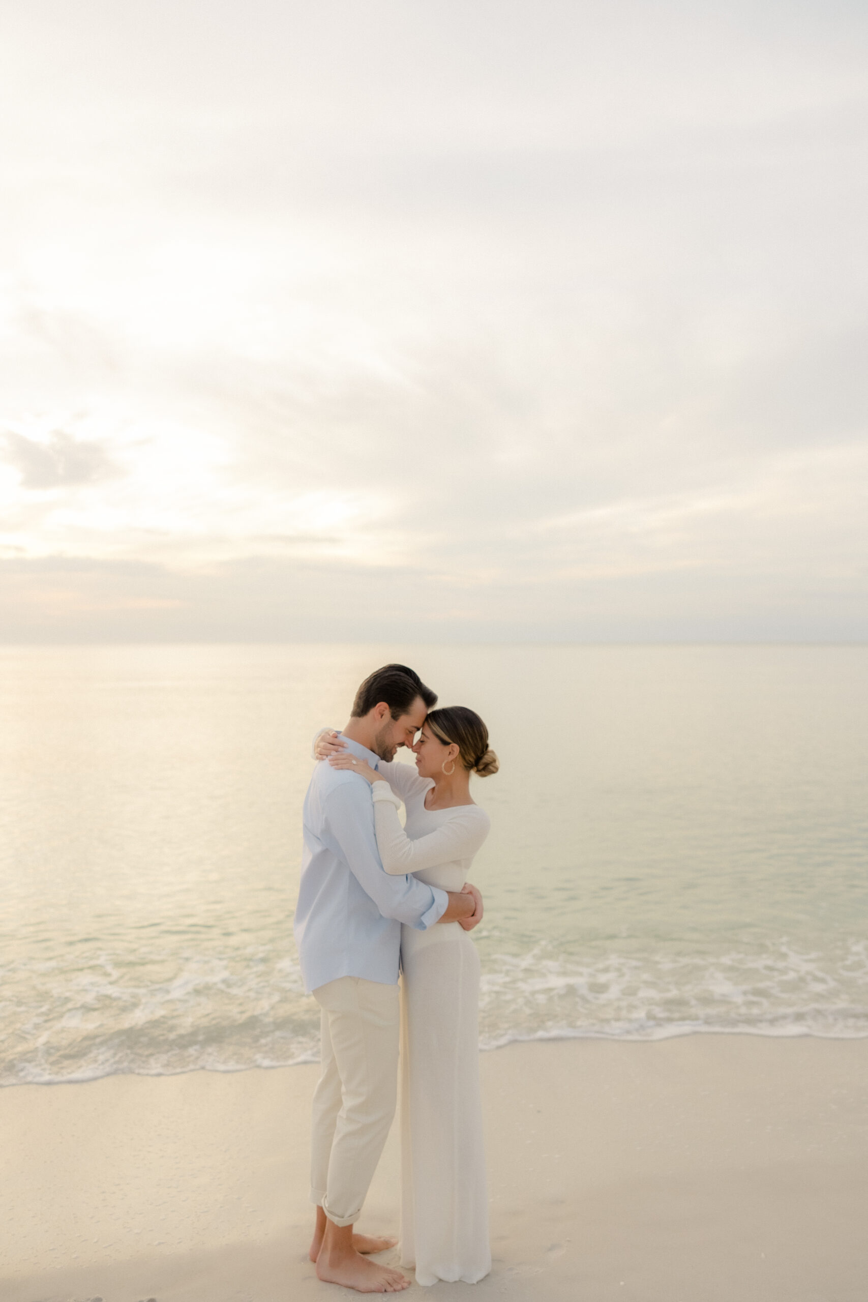 Naples Florida photographer, Maddie Briggs Photography captures creamy sunset after an intimate proposal.