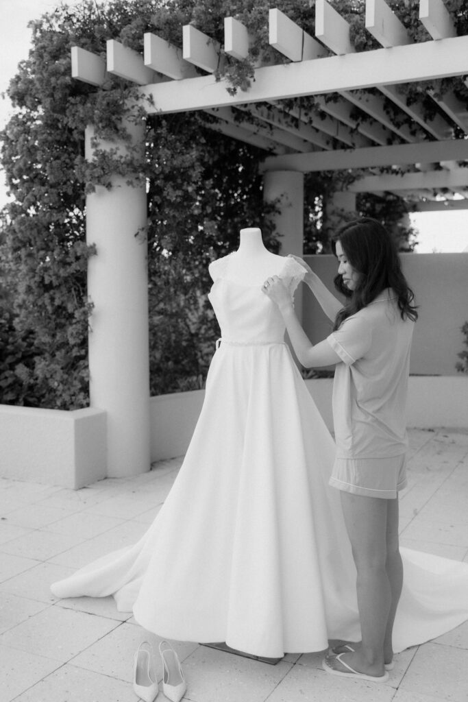 Modern bride getting ready for her wedding day at Bonita Bay Club.