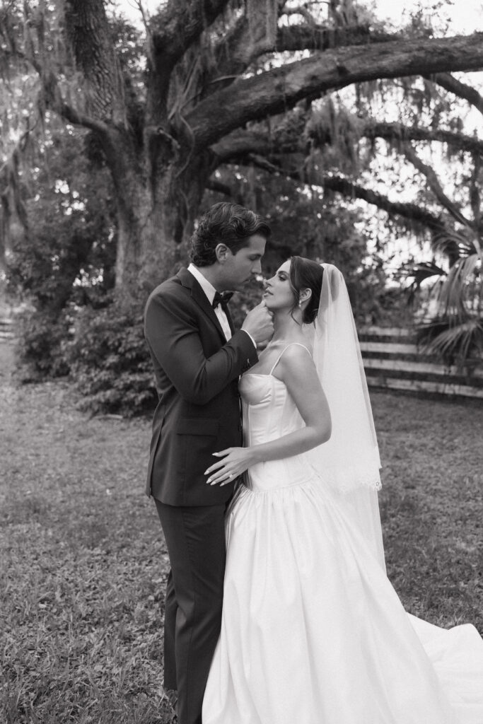 Emotional candid of bride and groom captured by destination wedding photographer in Florida